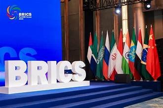 BRICS sign and member flags on a conference stage
