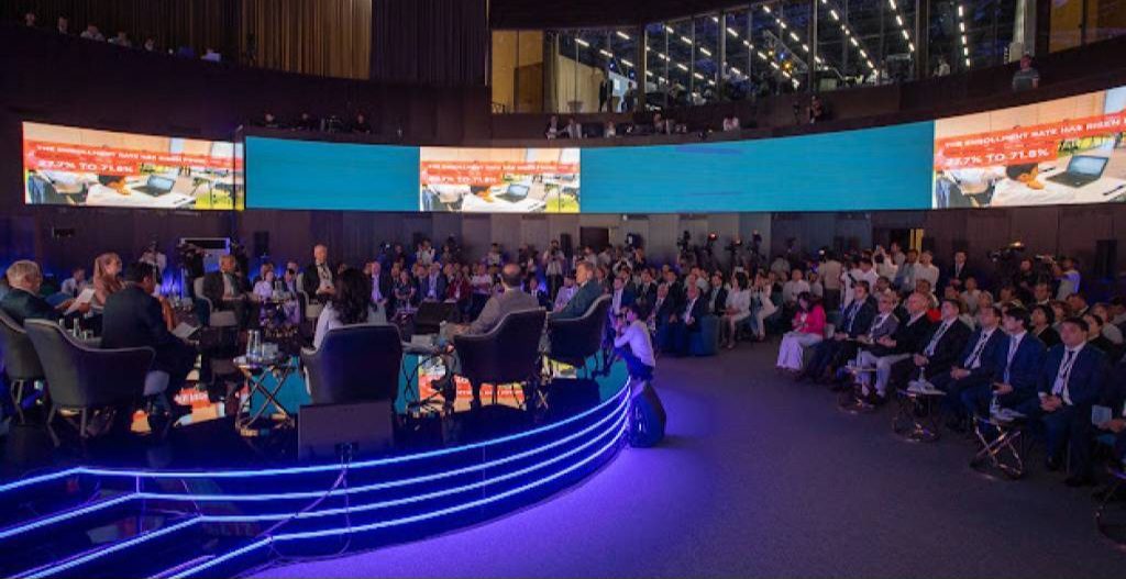 Audience in a conference hall at an Uzbek business event